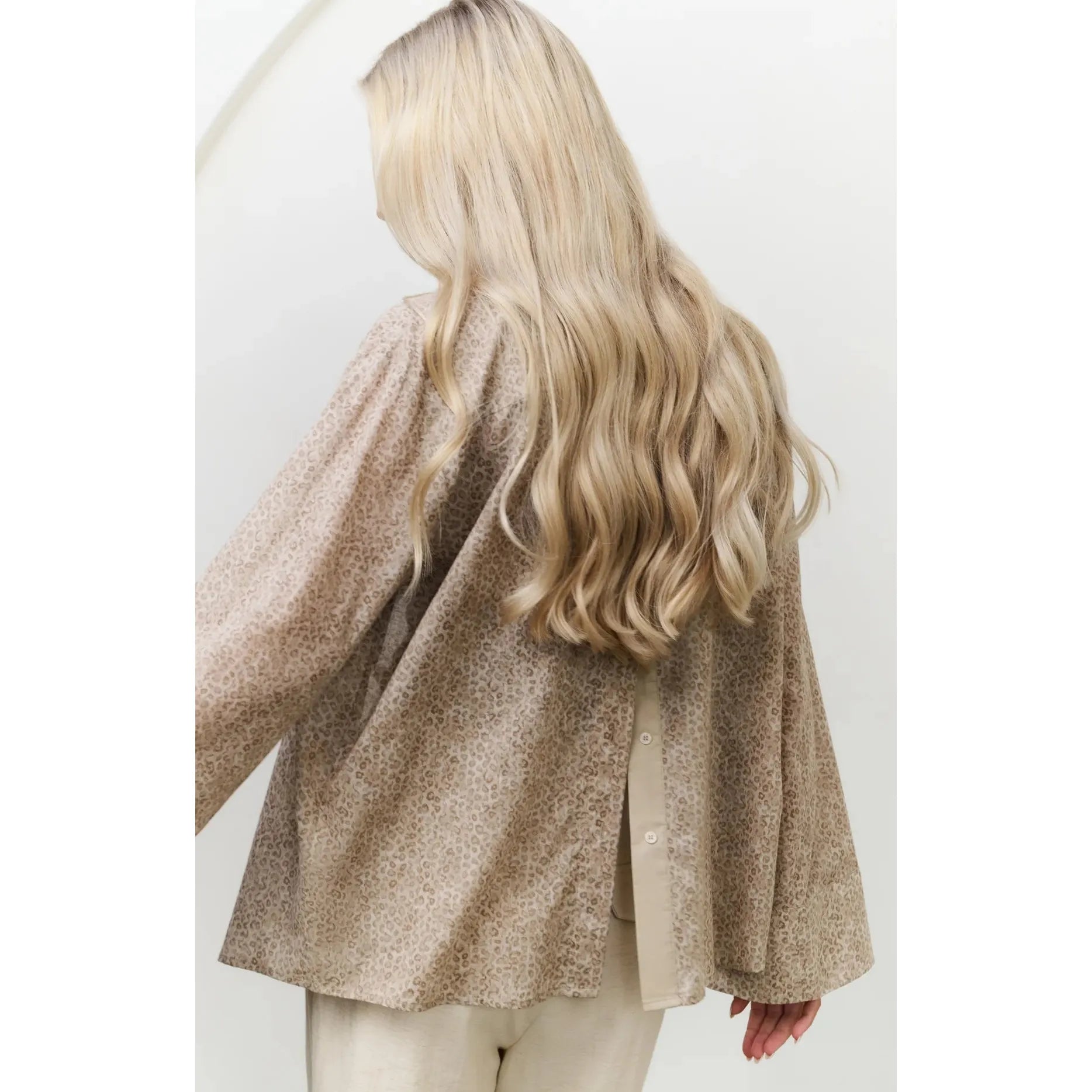 Leopard print blouse with back button detail