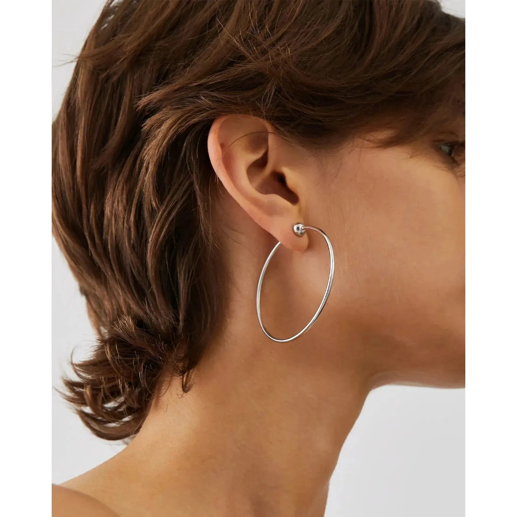 Jenny Bird Medium Iconic Hoops in Rhodium